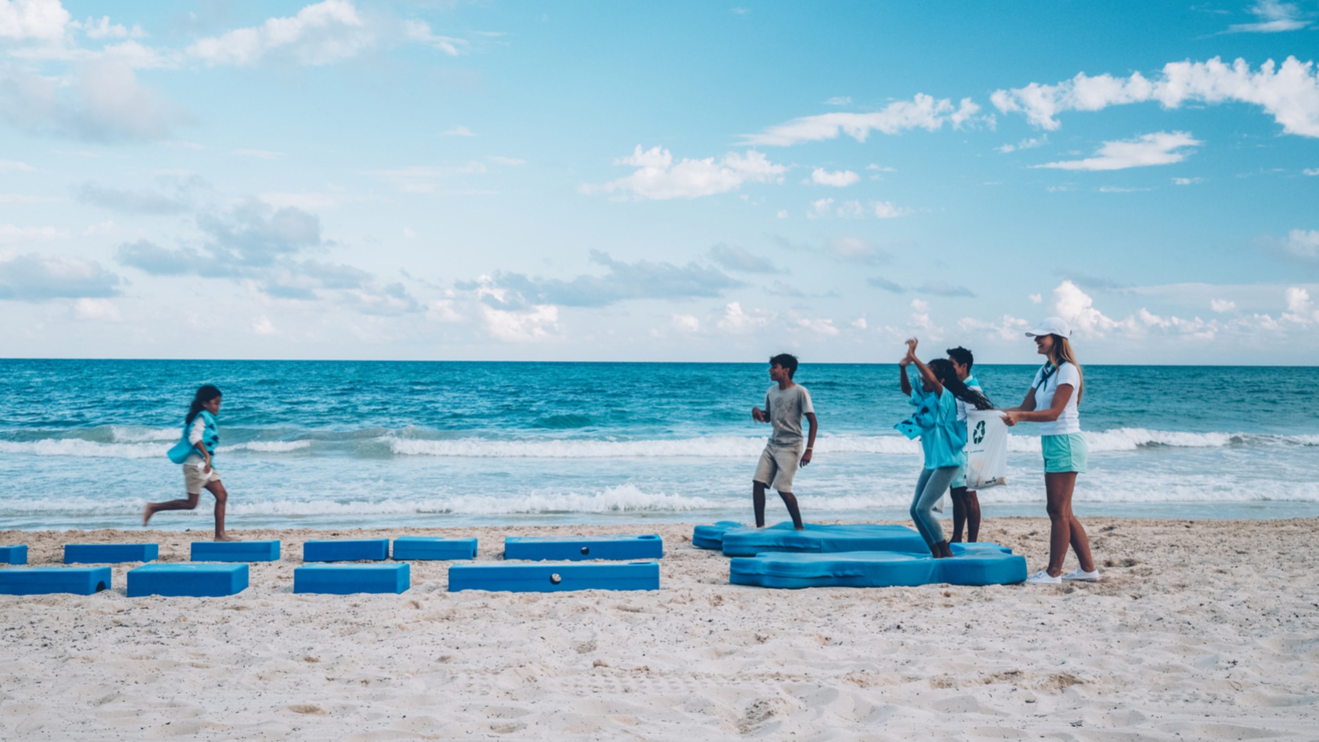 a group of people on a beach