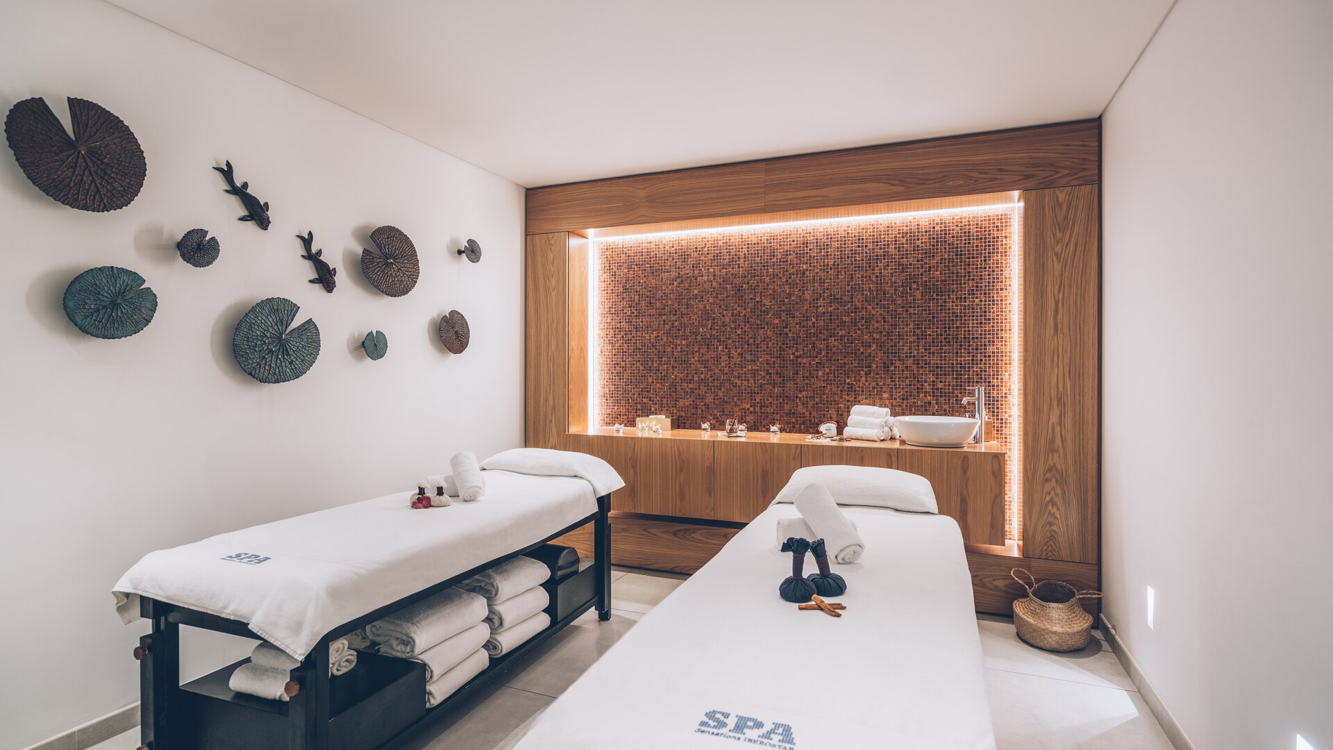 a bedroom with a bed and a mirror