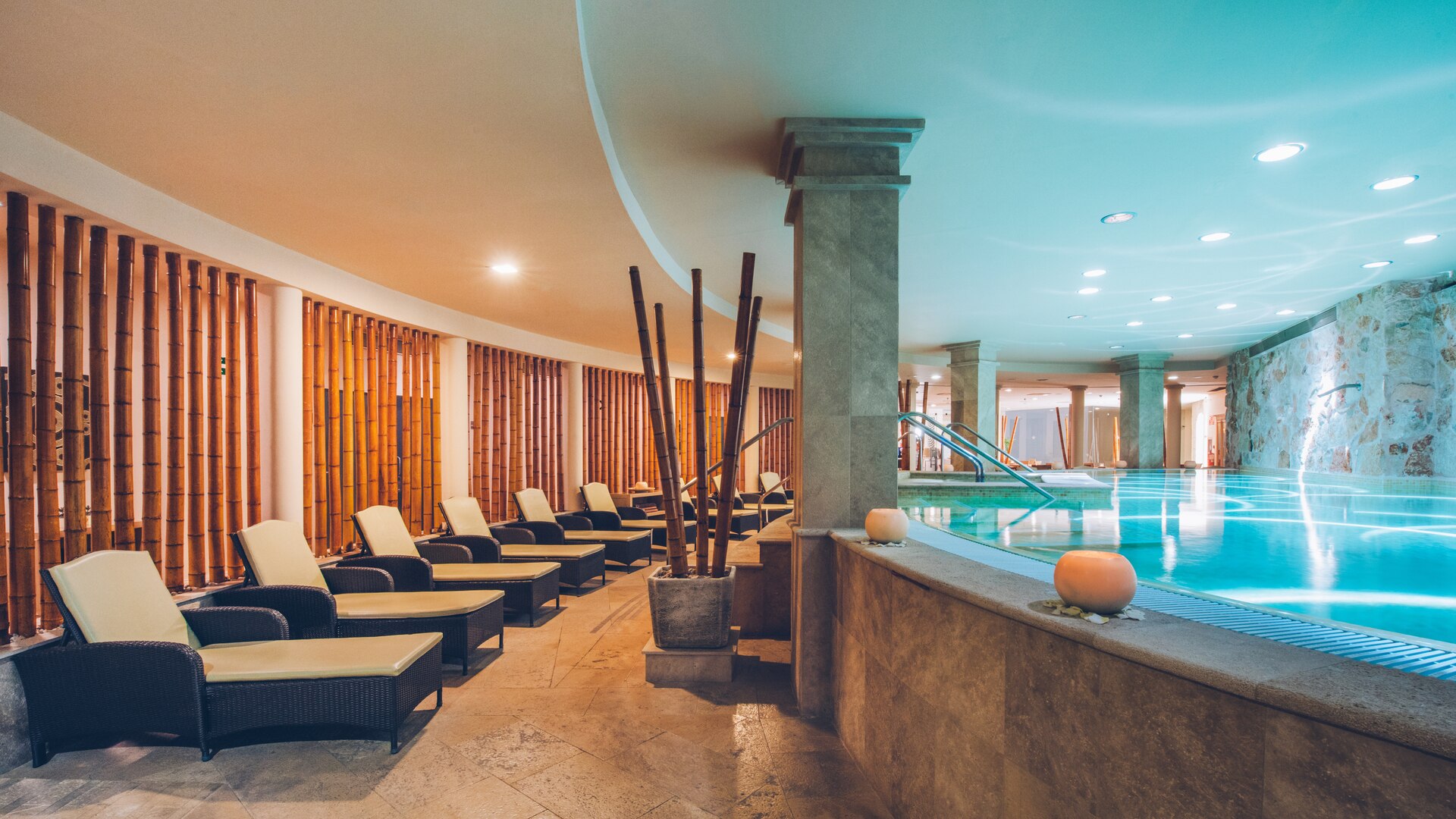 a room filled with furniture and vase on a table