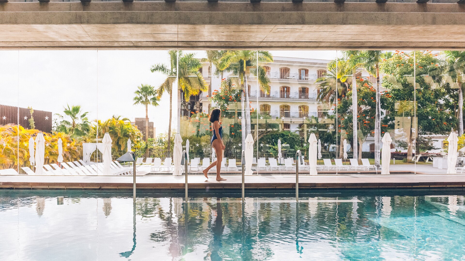 a large pool of water in front of a building