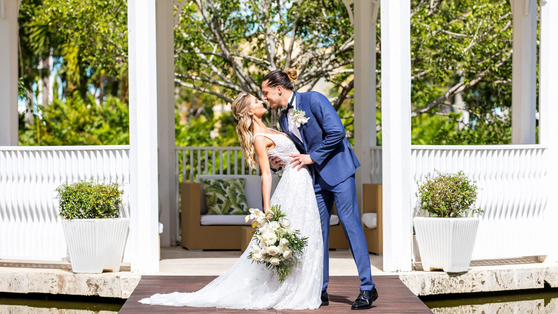 a man standing in front of a window
