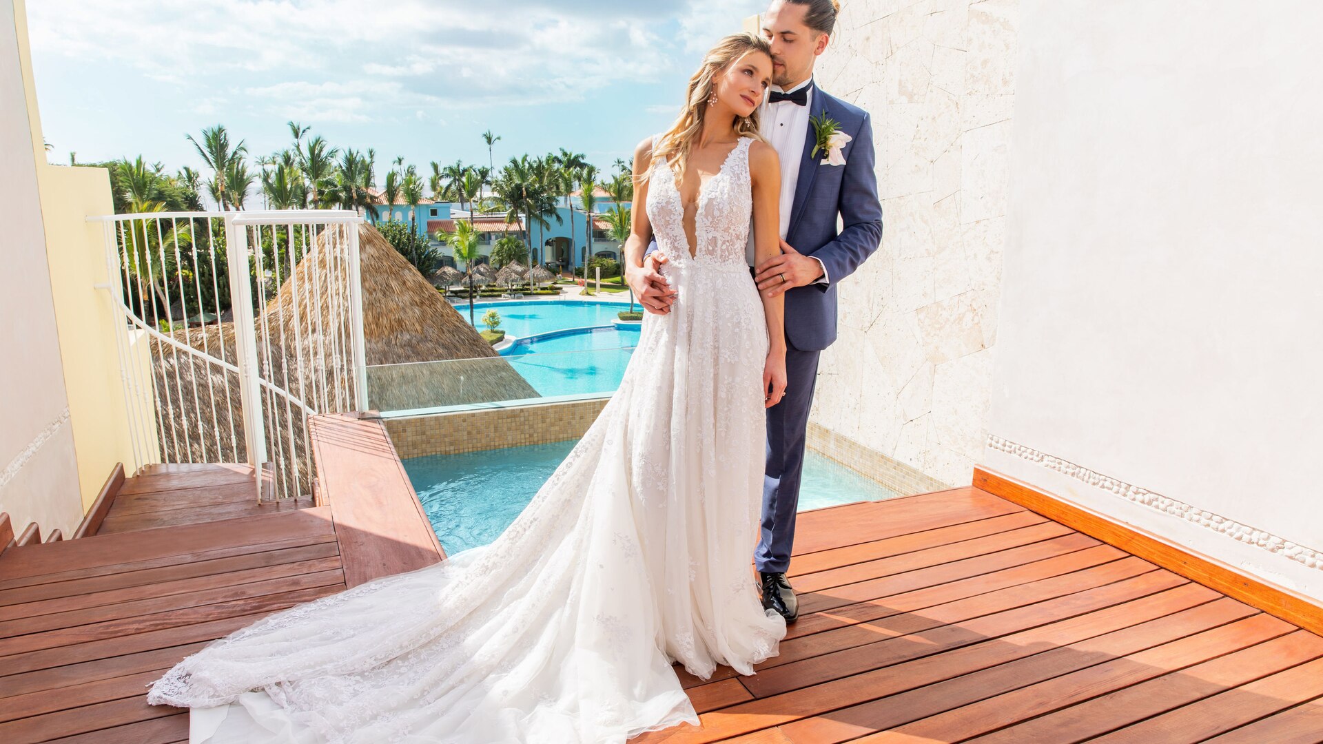 a person standing on top of a wooden ramp