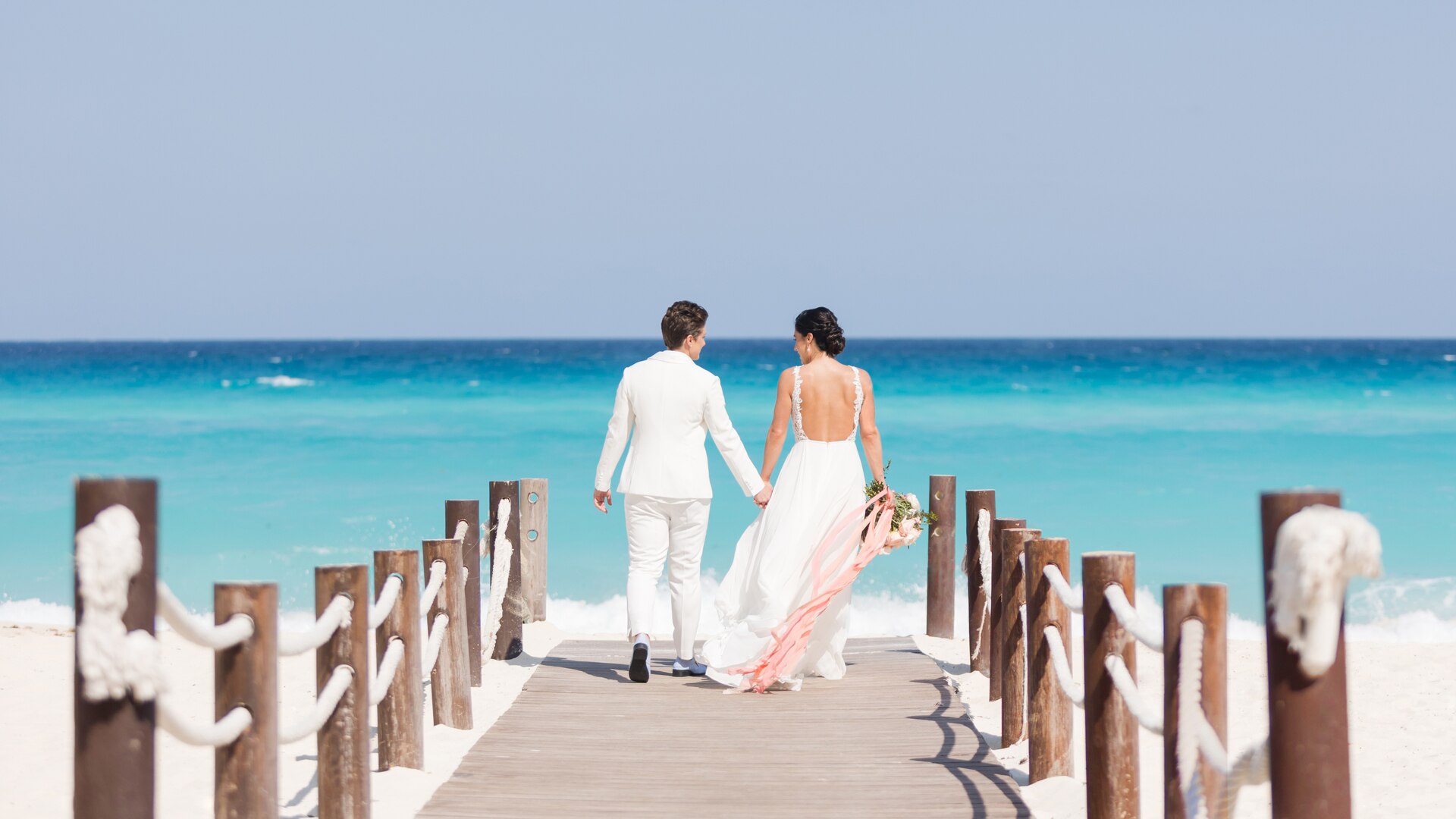 a group of people on a beach