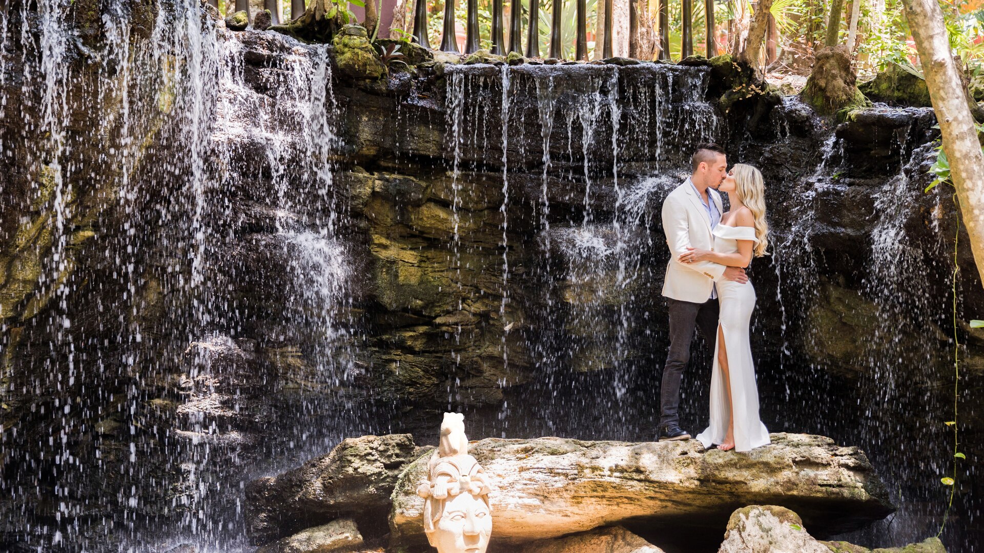 a person standing next to a tree