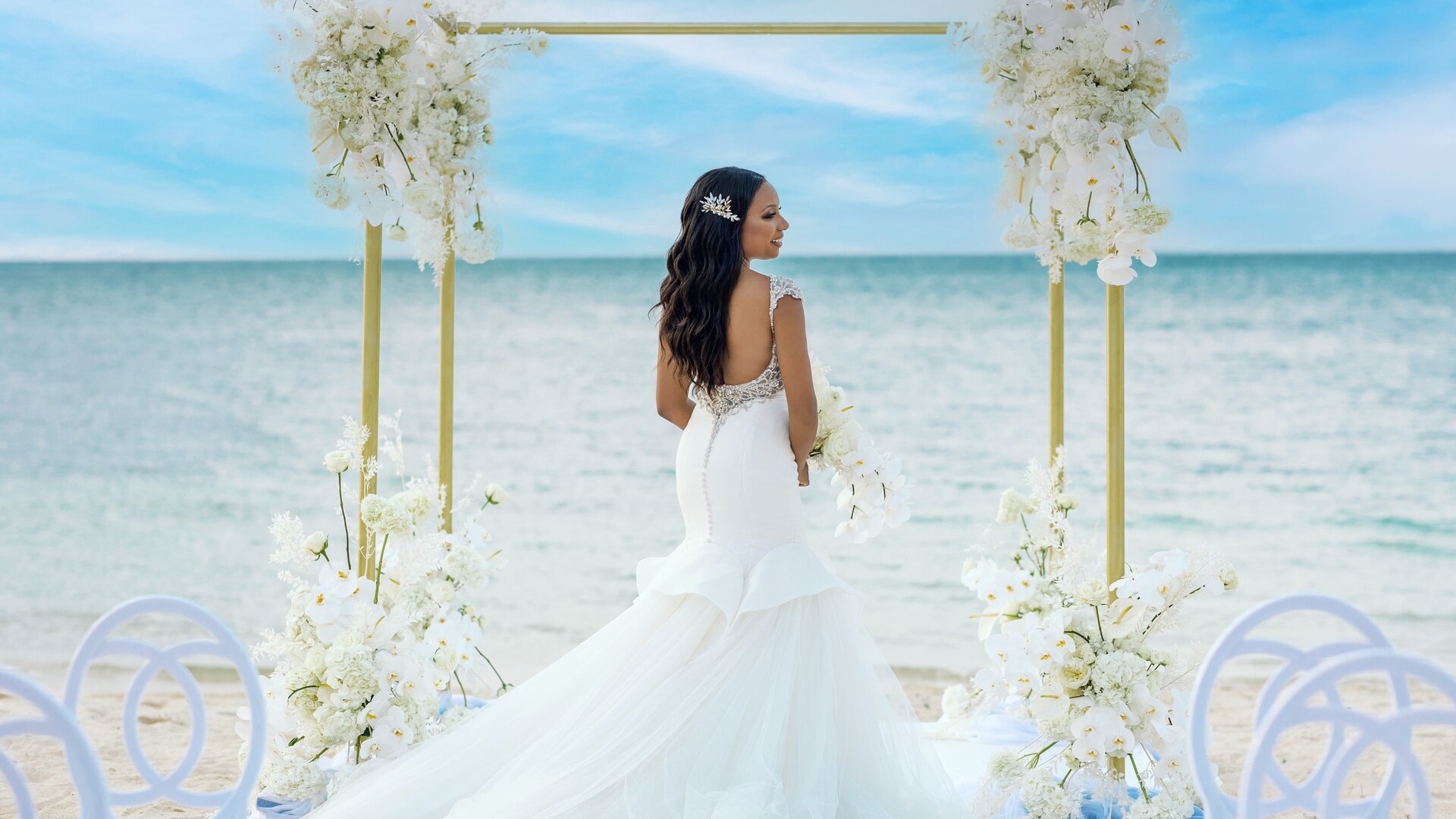 a person standing in front of a body of water