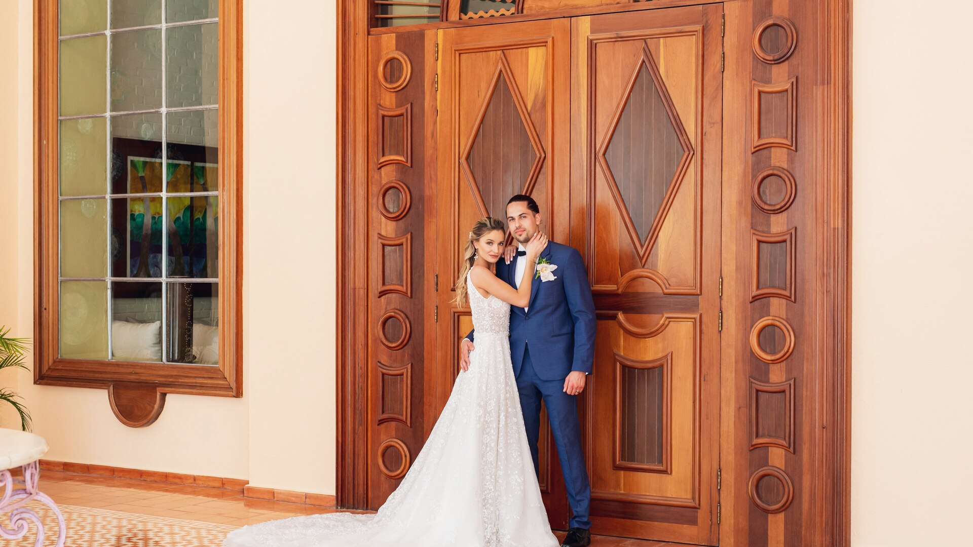 a person standing in front of a mirror posing for the camera