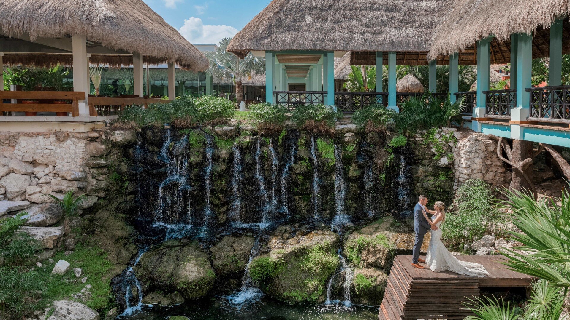 a stone bench sitting in front of a house
