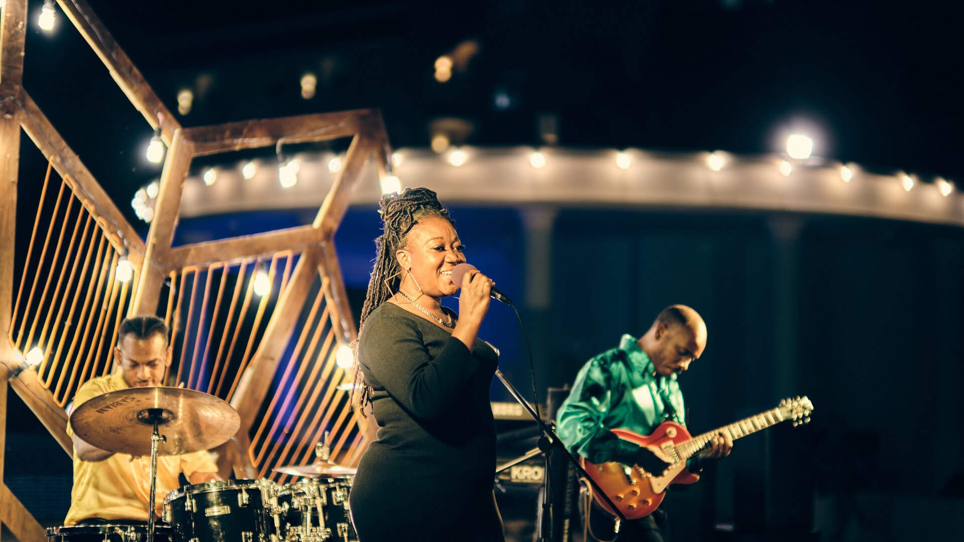 a man standing in front of a mirror posing for the camera