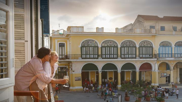 a person standing in front of a building