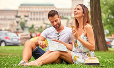 a man and a woman sitting on a bench