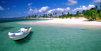 a small boat in a body of water