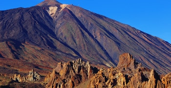 a canyon with a mountain in the background