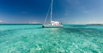 a small boat in a body of water