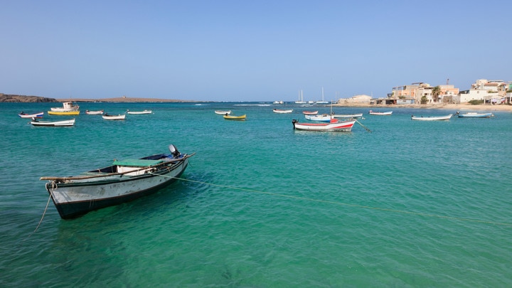 a small boat in a body of water