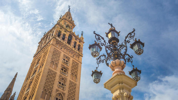 a clock tower in front of a building