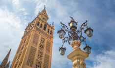 a clock tower in front of a building