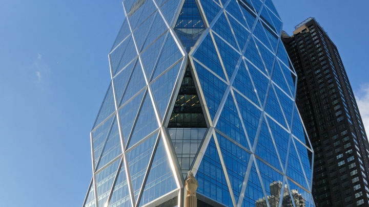 a tall building with Hearst Tower in the background