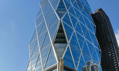 a tall building with Hearst Tower in the background