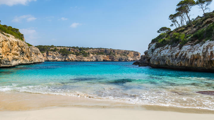 a beach next to a body of water