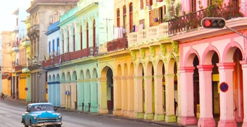 a car parked on the side of a building