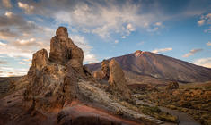 a canyon with a mountain in the background