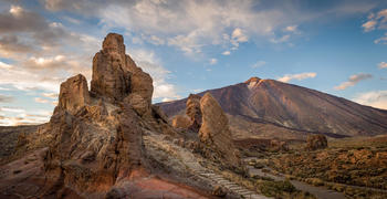 a canyon with a mountain in the background