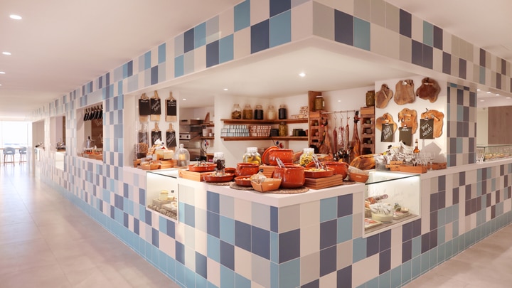 a kitchen with a tile floor