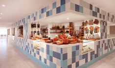 a kitchen with a tile floor