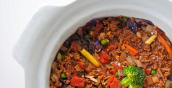 a bowl filled with meat and vegetables
