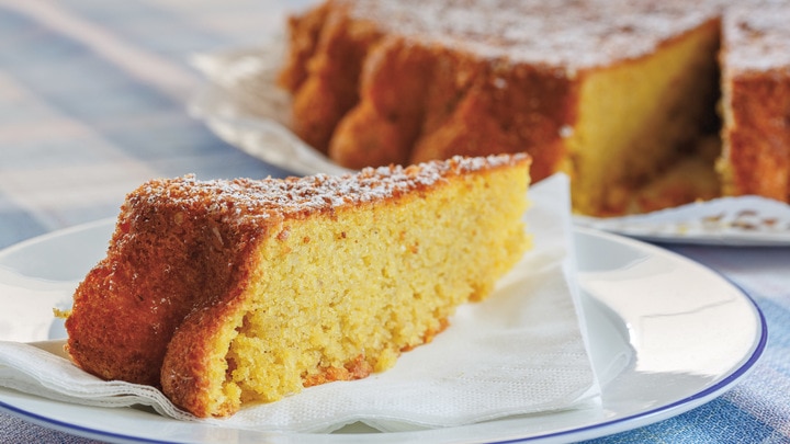 a close up of a piece of cake on a paper plate