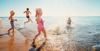 a group of people on a beach