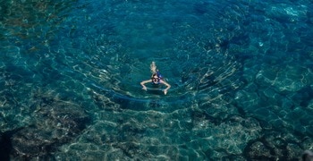 a person riding a jet ski